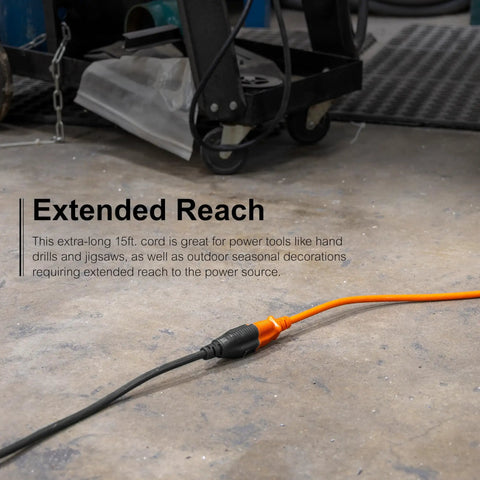 Outdoor Extension Cord 15 Feet Grounded Heavy Duty 16 AWG 3 Prong ETL Listed Black in workshop setting on floor