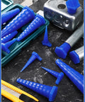 Blue 42 Piece Hydraulic Oil Service Plug Kit With Large Medium And Small Plugs arranged on a dark surface with tools