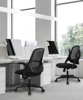 Ergonomic Office And Gaming Chair With Lumbar Support And Breathable Mesh Back Adjustable Height Swivel Rolling Wheels Flip Up Arms in office