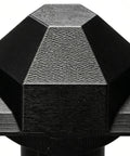 Close-up of Durable Universal Fit Lawn Spreader Replacement Part with Pro Grade Anti Clog Mechanism, showing textured black surface.