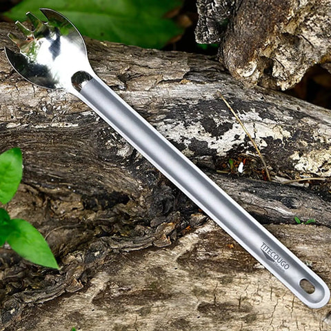 Ultra Lightweight Titanium Spork Multitool For Camping And Outdoors Long Spork With Spoon And Fork Combo on wooden surface