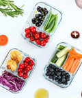 Premium Borosilicate Glass Meal Prep Containers 5 Pack With 3 Compartments And Lids filled with fresh vegetables and fruits