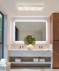 Rectangular Flush Mount LED Ceiling Light Fixture 24 Inch Long Crystal Dimmable in bathroom above dual vanity with mirror reflecting light