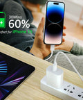 Front view of USB-C to USB-C charging cable, 2-pack, 10ft, white; charging iPhone 15 from wall adapter