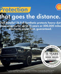 Truck driving on road with Shell Rotella T6 Full Synthetic ad promoting 15-year or 500,000-mile engine protection warranty.