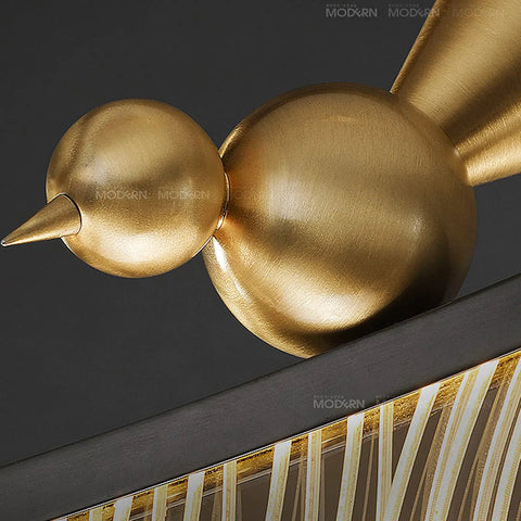 Detail of Sleek Modern Linear Pendant Light That Hits Different On Your Kitchen Island Or Dining Table with stylish gold accents.