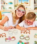 Child and adult enjoying Bulk 32 Pairs Summer Craft Coloring Glasses Kit With 8 Funky Designs Hawaiian Luau Beach Party Theme DIY Decor