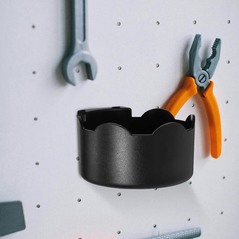 Black Plastic Aerosol Can Holder Wall Mount Organizer with tools on a pegboard