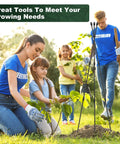 Volunteers setting up Outdoor And Indoor Garden Trellis With 47 Inch Obelisk And Tomato Cage in a garden, children assisting.