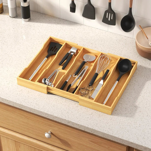 Expandable Kitchen Utensil Organizer Drawer Tray with natural wood finish on countertop