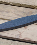 Ultra Coarse Manticore Scythe Sharpening Stone For Axes Machetes And Tools, Fast Pro Grade 260 Micron Grit on wooden surface