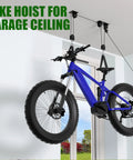 Ceiling Mount Bike Hoist With 100 Lb Capacity Overhead Storage For All Bike Types From E Bikes To Fat Tires Ideal Garage Or Workshop Space Saver Lift Your Ride Off The Floor And Free Up Cubic Footage blue bike mounted on ceiling lifting system