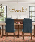 Dining room with Massive 36 Inch Classic Candelabra Farmhouse Chandelier With Six Candle Lights Antique Gold Painted Iron Pendant Ceiling Light Fixture For Dining Rooms And Large Spaces Vintage Style Indoor Lighting.