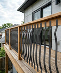 Tough As Nails Wave Deck Balusters 26 Pack Smooth Steel Railing Spindles With Black Mounting Screws 29.5 Inch Tall Posts installed on wooden deck