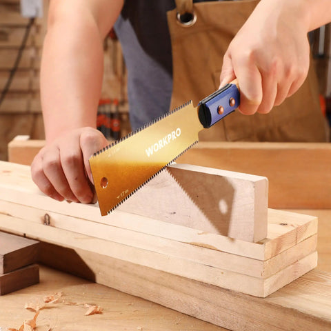 Kickass Six Inch Japanese Pull Saw Featuring Double Edged Design With Fourteen Teeth Rip Side And Seventeen Teeth Cross Cut Blades For Slick Precision Woodworking And Pro Grade Carpentry Projects in use cutting a wood plank.