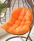 Thickened Hammock Swing Chair Cushion Set For Indoor Outdoor Relaxation on wicker hanging egg chair, orange cushion in room.