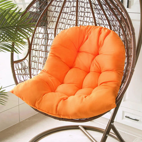 Thickened Hammock Swing Chair Cushion Set For Indoor Outdoor Relaxation on wicker hanging egg chair, orange cushion in room.