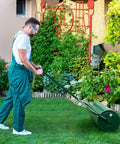 Person using Heavy Duty Lawn Roller Drum For Push Or Tow Behind Tractor, Rust Resistant Powder Coated Metal Frame on grass