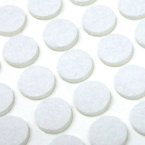 Self Adhesive Three Eighths Inch Felt Furniture Pads Pack Of Seventy Five White Sliders shown in rows on a flat surface