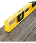 24 Inch Magnetic Top View Level Made In Usa Featuring Three Precision Vials For Dead On Accuracy on wooden surface.
