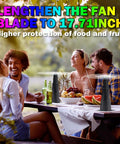 Group enjoying picnic with Four Pack Portable Fly Fans For Tables Indoors Outdoors Battery Powered Tabletop Fans keeping flies away.
