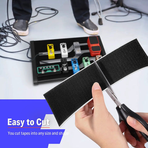 Person cutting Guitar Pedalboard Mounting Tape 2M Long By 50mm Wide With Hook And Loop, ultra-strong adhesive, with scissors.