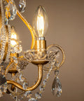 Close-up of the Four Light Crystal Chandelier in Antique Gold 14 Inch Diameter Dining Room Pendant Swag Light with teardrop beads