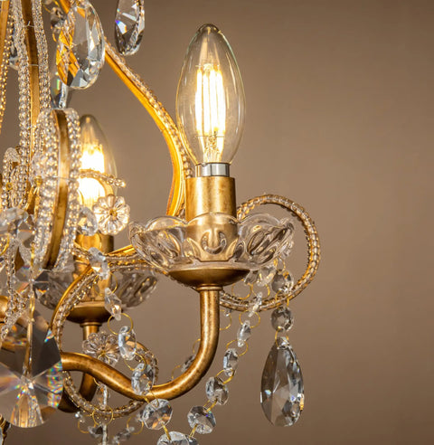 Close-up of the Four Light Crystal Chandelier in Antique Gold 14 Inch Diameter Dining Room Pendant Swag Light with teardrop beads