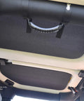 Boom Mat black sound-deadening headliner panels for 4‑door Jeep Wrangler JL; peel-and-stick thermal insulation.