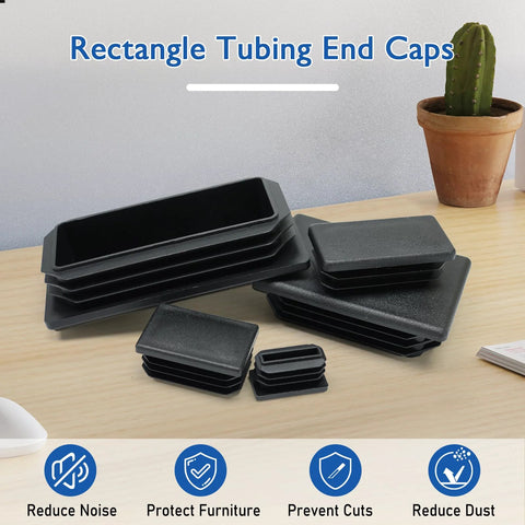 Rectangular Tubing End Caps Four Pack for 2 By 4 Inch Tubes Plastic Black End Plugs on table for metal tubing fences and furniture.