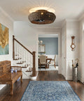 20" Boho Ceiling Fan with Light, Rattan Caged Ceiling Fan with Remote in a stylish hallway setting.