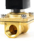 Close-up of the brass half inch solenoid valve showing the NPT connection and base with Viton seal, 110V AC normally closed for fluid control.