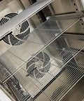Interior view of Top Shelf Heavy Duty Commercial Blast Freezer 241 Liter Capacity with stainless steel wire shelves and cooling fans.