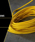 Heavy Duty One Hundred Foot Contractor Extension Cord Twelve Three SJTW Fifteen Amp With Lighted Ends coiled on floor