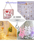 No Hole Adhesive Ceiling Hooks Set Of 10 For Hanging Lights Plants Mobiles Curtains And More Easy Renters Friendly Wall And Ceiling Hangers No Drill Required Round Design Strong Hold shown in decorative settings.