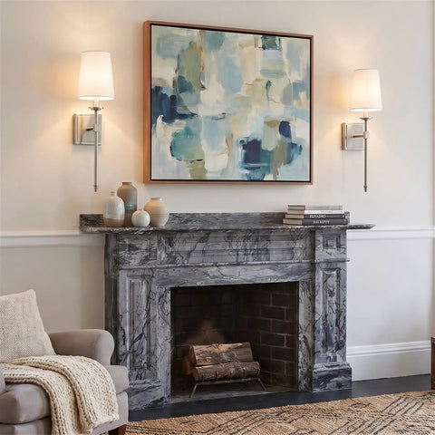 Kira Home Torche 20" Mid Century Modern Wall Sconce for Bathroom Vanity, Pack of 2 installed beside abstract art.