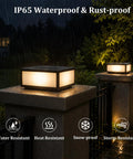 Hella Stylish Modern 15.75 Inch Flat Surface Pillar Lights For Outdoor Porch Deck Post With Romantic Soft Candle Glow Industrial Column Cap Lamp For Sweet Night Vibes And Cozy Patio Decor illuminated on wet stone pillars at night.