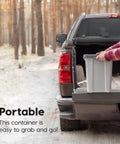 Stackable Dog Food Storage Container With Airtight Gasket Seal And Four Latches Keeps Your Pet Chow Fresh Holds Up To 30 Lbs Of Dry Food Includes 2 Cup Scoop And Easy Measure Lid BPA Free Gray being loaded into truck