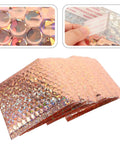 Stack of 20 Pack Air Cushion Mailers 15x13cm Self Sealing Padded Shipping Bags For Clothes shown in rose gold color