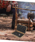 Five-Piece Wear-Resistant Tool Case for Outdoor Survival Gear near campsite with logs and kettle, durable storage box shown open