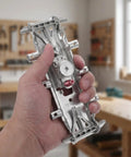 Hand holding No Drill Cabinet Bracket Set Concealed Steel Shelf Brackets for kitchen cabinet mounting, 14x6.35x2.5cm