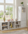 Stackable Cube Storage Organizer For Home And Office DIY Modular Shelving Cubes in white washed finish by a window with decor.