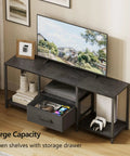 Slick Industrial TV Stand With Fabric Drawer For Fifty Five Inch TV Sweet Entertainment Center With Open Shelves Media Console Table That Definitely Nails The Vibe In Any Living Room Or Bedroom Top Notch Black Build, showcasing a TV on the matte black console with open shelves and a storage drawer.