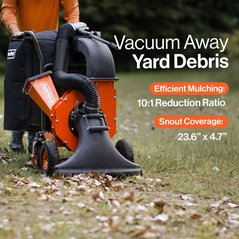 Gas Powered Leaf Vacuum And Wood Chipper Combo With 7HP 209cc Engine shown vacuuming leaves on grass, orange unit with black snout