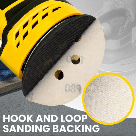 Close-up of Top Tier 5 Inch Hook And Loop Sanding Discs With 40 To 1000 Grit Assorted Aluminum Oxide Pads backing for random orbital sanders.