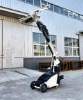 Built Tough Heavy Duty Vacuum Glass Lifter With Adjustable Frame Design And Pro Grade Suction Cup Robot lifting large glass pane outdoors.