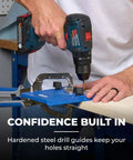 Man using Portable Cabinet Hardware Jig With Edge Guide For Knobs And Small Pulls, Boss Level Accuracy For Straight Hole Drilling