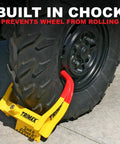 Beefy Trailer Wheel Lock Fits 6 To 10.5 Inch Tires And Heavy Gauge Powder Coated Steel Wheel Boot Lock shows built-in chock in use