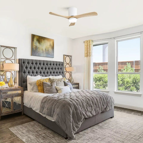 42" Low Profile Ceiling Fan with Light, Matte White Wood Blade Flush Mount Fan in modern bedroom with grey furnishings.