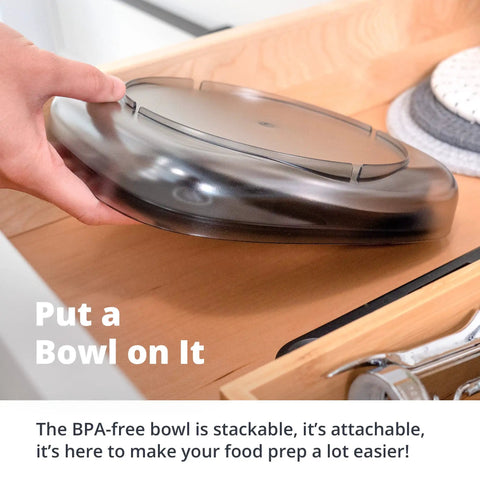 Person placing a BPA-free, stackable bowl lid in a kitchen drawer.